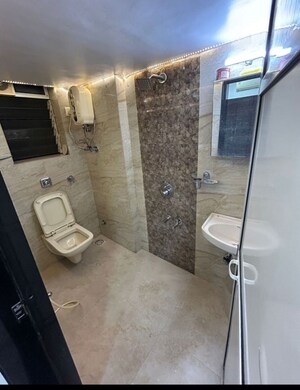 Bathroom in 3 BHK Apartment at Nilkanth Apartment Naupada, Naupada – for Rent