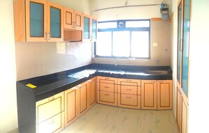 Kitchen in 2 BHK Apartment at Cosmos Heritage, Manpada – for Rent