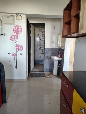 Kitchen in 3 BHK Apartment at Raichandani Megha Terrace CHS, Aundh – for Rent