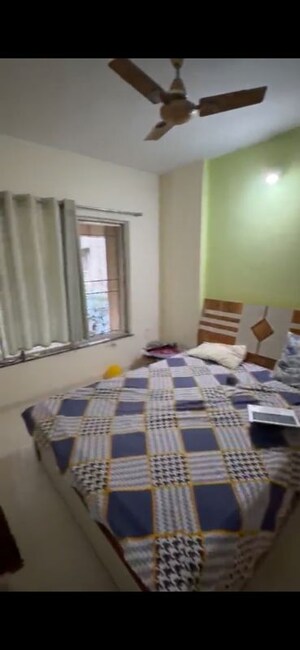 Living Room in 2 BHK Apartment at Moraya Radhey Premlok CHS, Chinchwad – for Rent