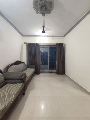 Living Room in 2 BHK Apartment at Dosti Group Maitri Vatika, Kalwa – for Rent