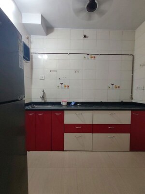 Kitchen in 2 BHK Apartment at Dosti Group Maitri Vatika, Kalwa – for Rent