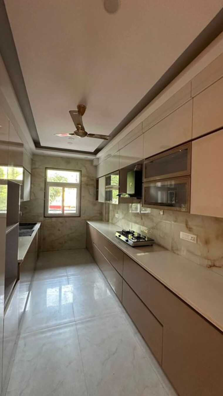 Kitchen, soami nagar 4 Bedroom 600 Sq.Yd. Builder Floor In Soami Nagar Delhi 10638895