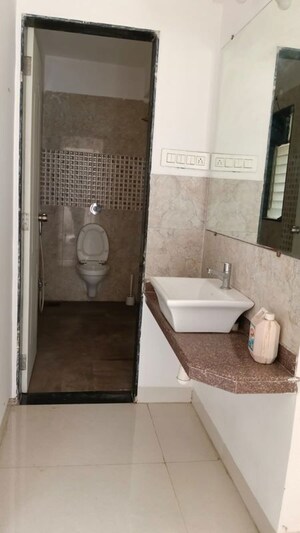 Bathroom in 2 BHK Apartment at Shree Tirupati Maple Tower, Kondhwa – for Rent