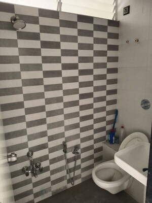 Bathroom in 3 BHK Apartment at Godrej Garden City, Jagatpur – for Rent