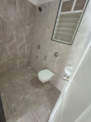 Bathroom in 2 BHK Apartment at Gulmohar Skypark, Dhanori – for Rent