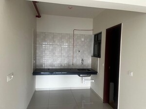 Kitchen in 2 BHK Apartment at Paranjape Blue Ridge, Hinjewadi – for Rent