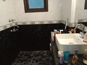 Bathroom in 2 BHK Apartment at Kailash Colony – for Rent