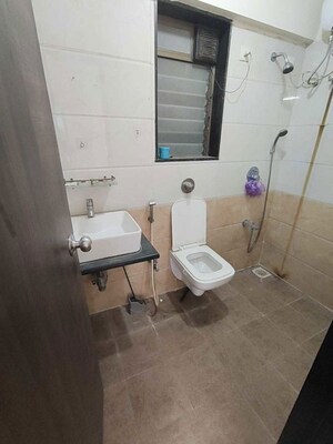 Bathroom in 2 BHK Apartment at Sethia Kalpavruksh Heights, Kandivali West – for Rent