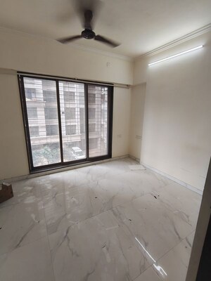 Bedroom in 2 BHK Apartment at Sethia Kalpavruksh Heights, Kandivali West – for Rent