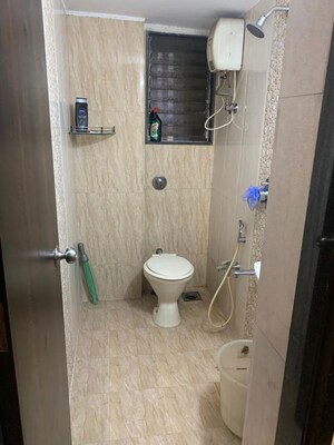 Bathroom in 2 BHK Apartment at Shri Balaji Ashirwad, Malad West – for Rent