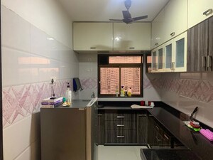 Kitchen in 2 BHK Apartment at Shri Balaji Ashirwad, Malad West – for Rent