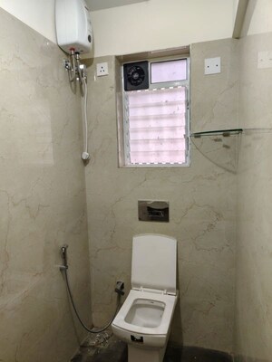 Bathroom in 2 BHK Apartment at Mamtora Shree Govind Krupa, Malad West – for Rent