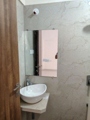 Bathroom in 2 BHK Apartment at Mamtora Shree Govind Krupa, Malad West – for Rent