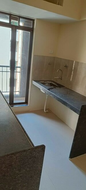 Kitchen in 2 BHK Apartment at Rustomjee Avenue L1, Virar West – for Sale