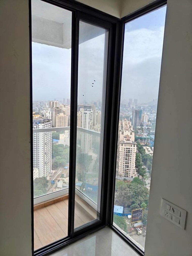 Balcony, dhamji-shamji-mahavir-spring-tulip-phase-1 2 Bedroom 900 Sq.Ft. Apartment In Pokhran Road No Two Thane 10639086