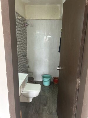 Bathroom in 1 BHK Apartment at Kolte Patil Green Acre, Salunkhe Vihar Society – for Rent