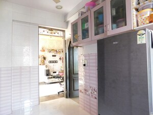 Kitchen in 1 BHK Apartment at Prathana Acharya Ashram, Borivali West – for Sale