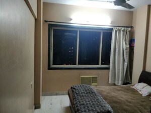 Bedroom in 2 BHK Apartment at New Nikita Apartments, Borivali West – for Rent