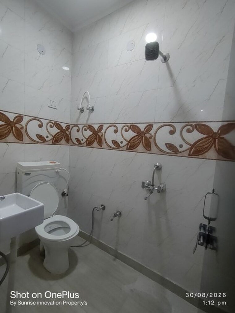 Bathroom, dwarka mor 2 Bedroom 650 Sq.Ft. Builder Floor In Dwarka Mor Delhi 10639182