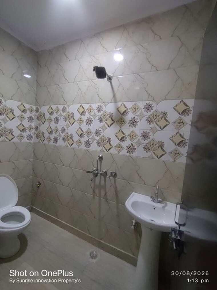 Bathroom, dwarka mor 2 Bedroom 650 Sq.Ft. Builder Floor In Dwarka Mor Delhi 10639182