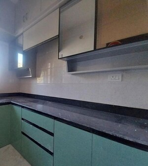 Kitchen in 2 BHK Apartment at Jai Hanuman Riverside, Uttarpara – for Sale