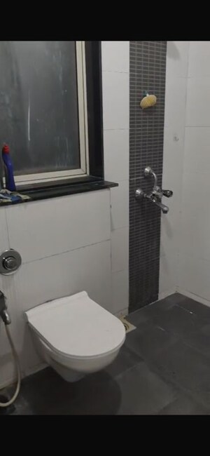 Bathroom in 1 BHK Apartment at Ashish Parkwoods, Ghodbunder Road – for Rent