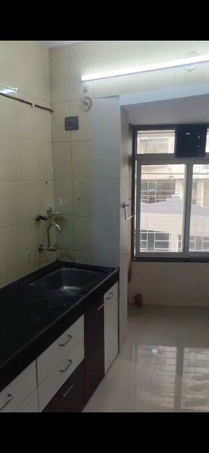 Kitchen in 2 BHK Apartment at HDIL Dheeraj Diamond, Malad West – for Rent