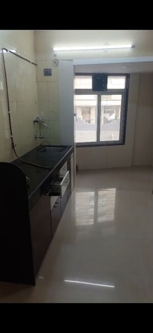Kitchen in 2 BHK Apartment at HDIL Dheeraj Diamond, Malad West – for Rent