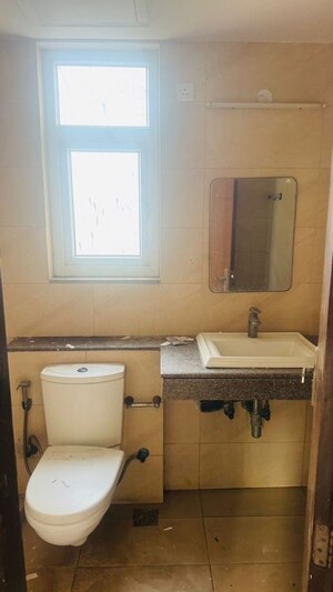 Bathroom in 3 BHK Apartment at Puri Anand Villas Phase II, Sector 81 – for Rent
