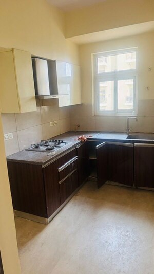 Kitchen in 3 BHK Apartment at Puri Anand Villas Phase II, Sector 81 – for Rent