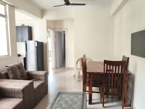Living Room in 2 BHK Apartment at Gaurs Green Vista, Nyay Khand – for Rent