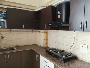 Kitchen in 2 BHK Apartment at Gaurs Green Vista, Nyay Khand – for Rent