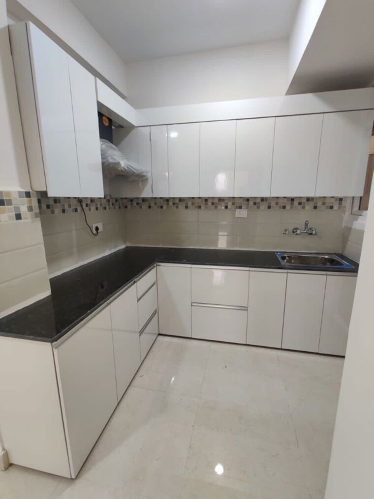 Kitchen, signature-global-orchard-avenue 2 Bedroom 850 Sq.Ft. Apartment In Sector 93 Gurgaon 10639291