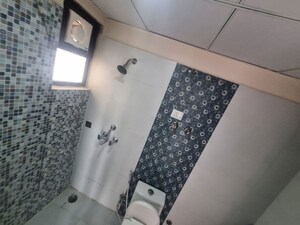 Bathroom in 2 BHK Apartment at KM Residency, Raj Nagar Extension – for Sale