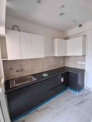 Kitchen in 2 BHK Apartment at Meenal Balmukund Residency, Raj Nagar Extension – for Sale