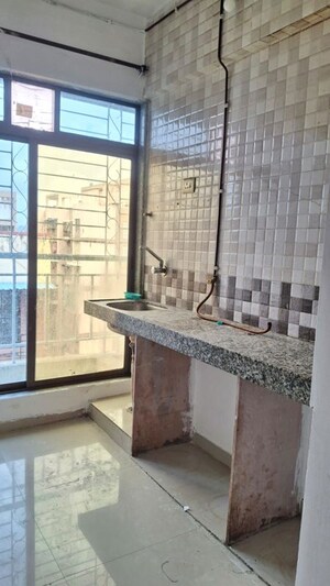 Kitchen in 1 BHK Apartment at Elegant Olympia, Ulwe – for Rent