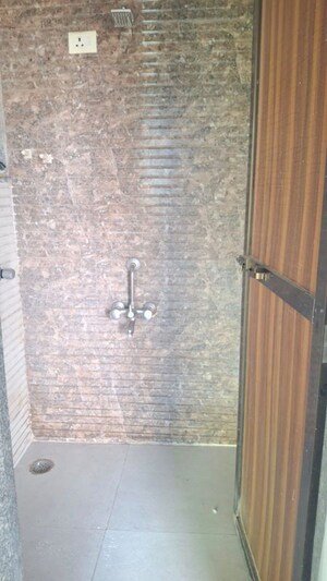 Bathroom in 1 BHK Apartment at Elegant Olympia, Ulwe – for Rent