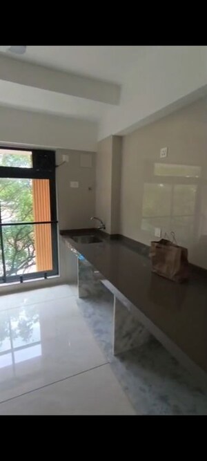 Living Room in 1 BHK Apartment at Prachi CHS, Navpada – for Rent