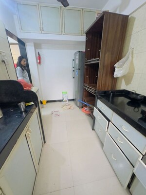 Kitchen in 1 BHK Apartment at Rose Garden CHS, Borivali West – for Rent