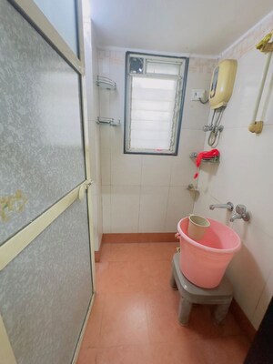 Bathroom in 1 BHK Apartment at Rose Garden CHS, Borivali West – for Rent