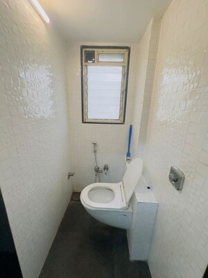 Bathroom in 1 BHK Apartment at Rose Garden CHS, Borivali West – for Rent