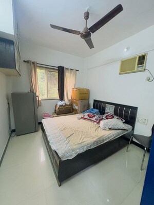 Bedroom in 1 BHK Apartment at Rose Garden CHS, Borivali West – for Rent