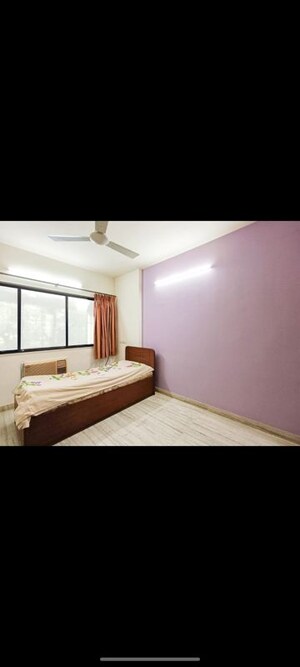 Bedroom in 2 BHK Apartment at Hatkesh CHS, Vile Parle West – for Rent
