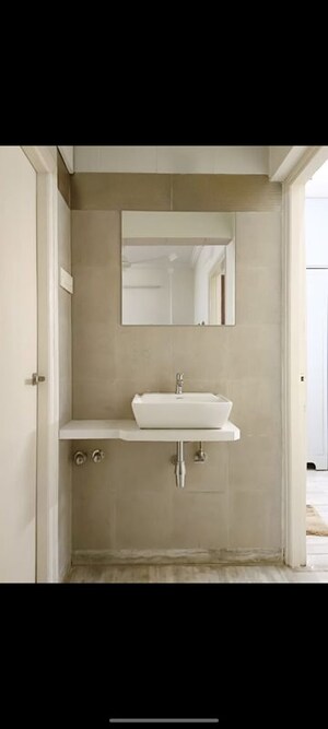 Bathroom in 2 BHK Apartment at Hatkesh CHS, Vile Parle West – for Rent
