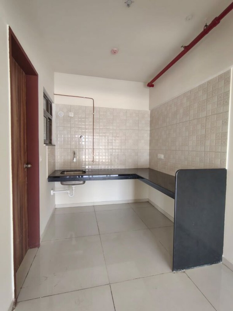 Kitchen, paranjape-blue-ridge 2 Bedroom 1050 Sq.Ft. Apartment In Hinjewadi Pune 10639534