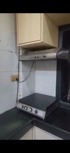 Kitchen in 2 BHK Apartment at Dheeraj Pooja, Malad West – for Rent