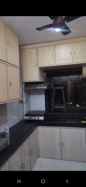 Kitchen in 2 BHK Apartment at Dheeraj Pooja, Malad West – for Rent