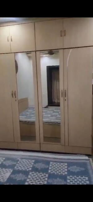 Bedroom in 2 BHK Apartment at Dheeraj Pooja, Malad West – for Rent