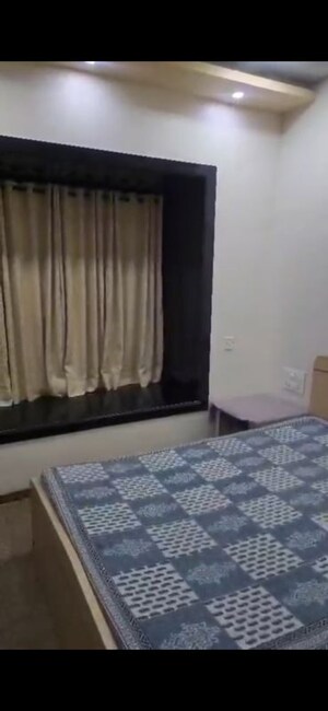 Bedroom in 2 BHK Apartment at Dheeraj Pooja, Malad West – for Rent